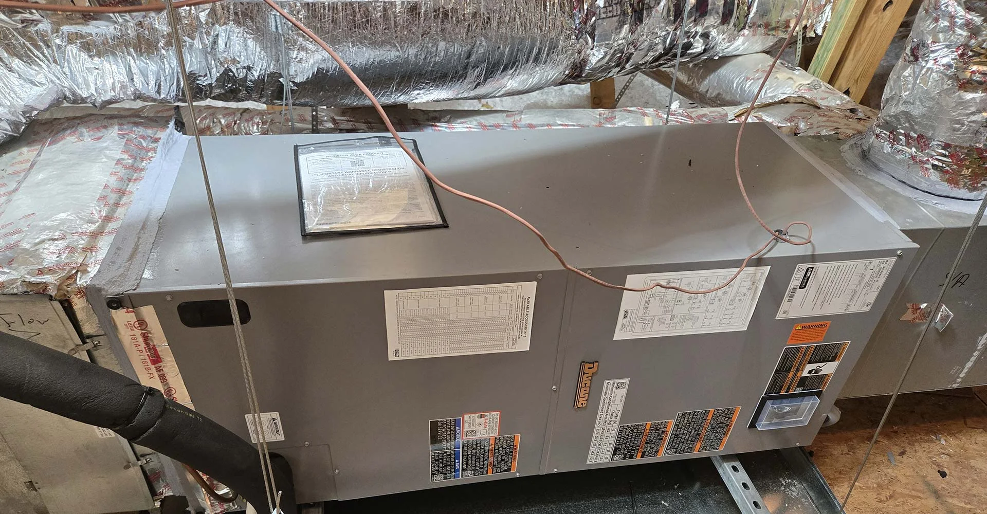 Whole-home dehumidifier and air handler installation in a North Texas attic