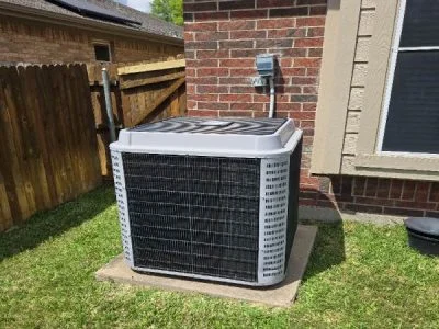 Residential heat pump serving a North Texas home year-round