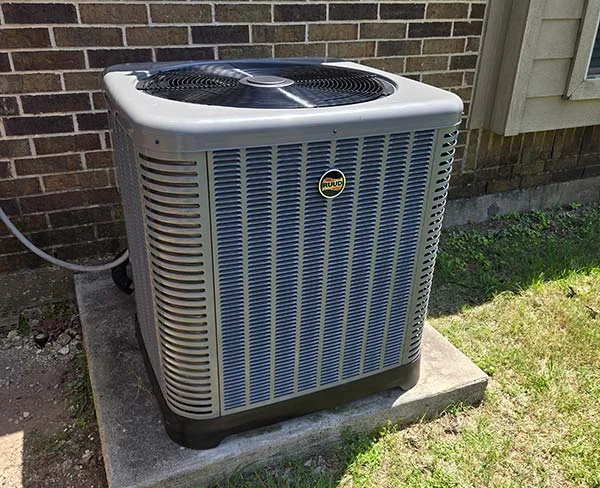 Central air conditioning condenser installed at a North Texas home